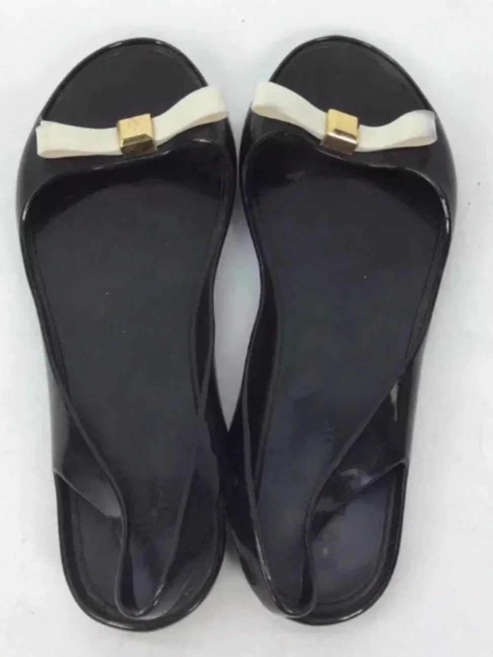 kate spade Black Jelly Flats with Cream Bow and Gold Accent